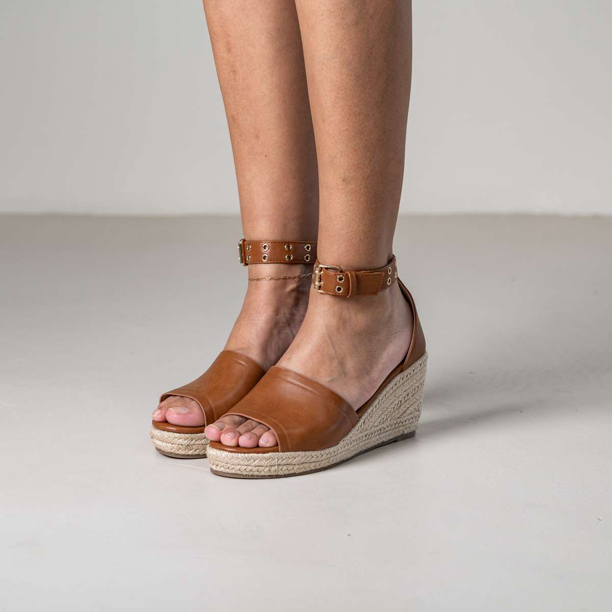 Mitohi wedge sandals with ankle strap and open toe