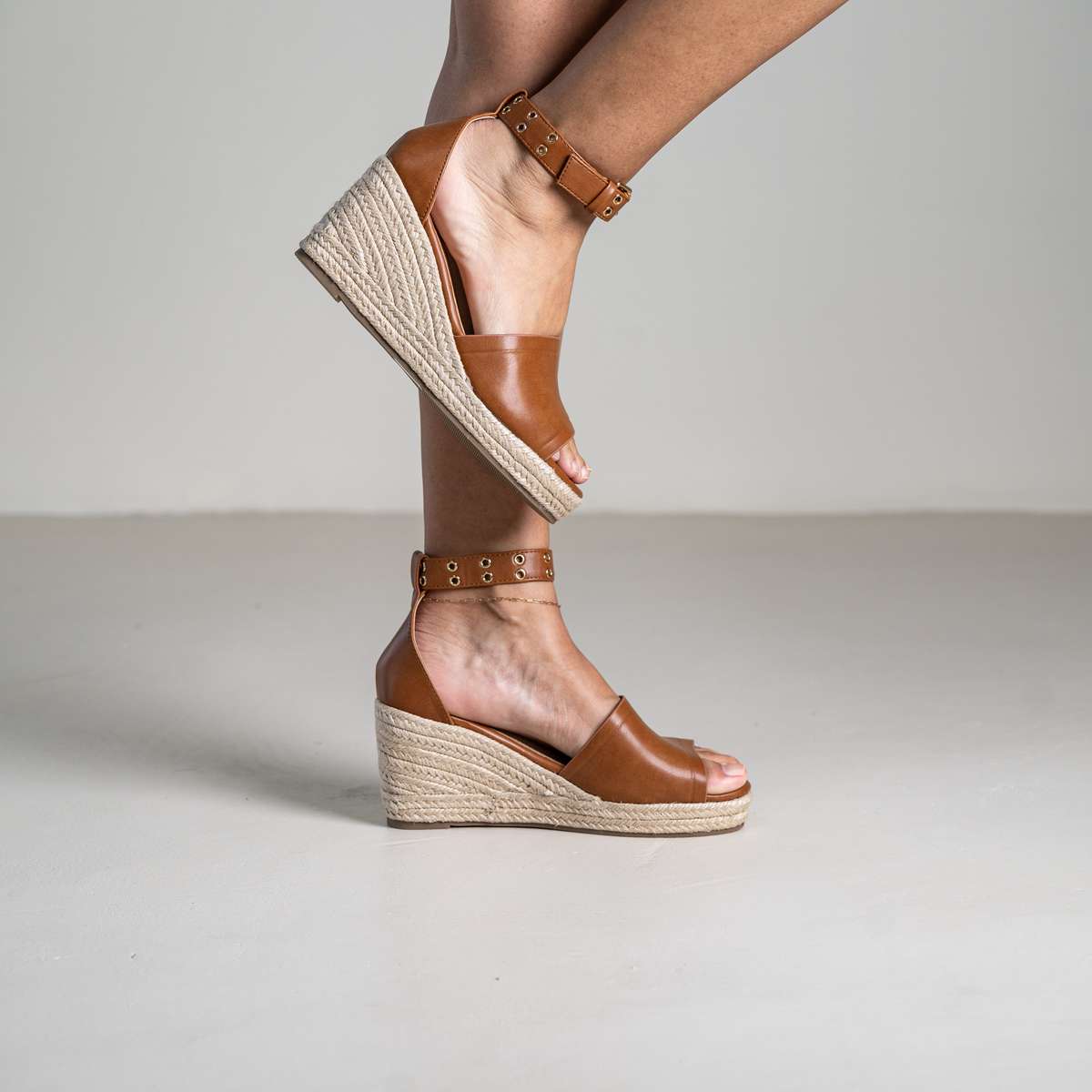 Mitohi wedge sandals with ankle strap and open toe