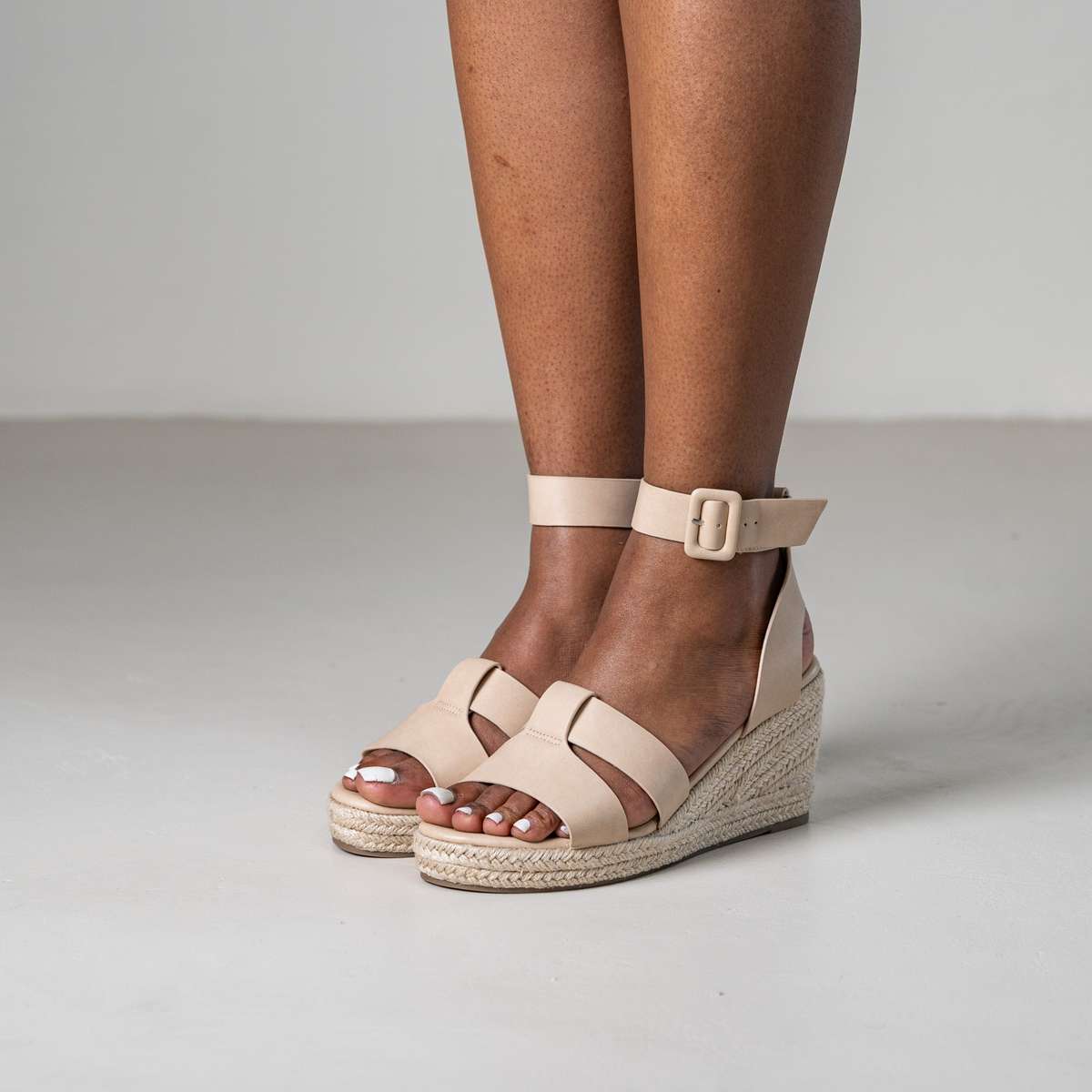 Tohima wedge sandals with crisscross straps and ankle strap