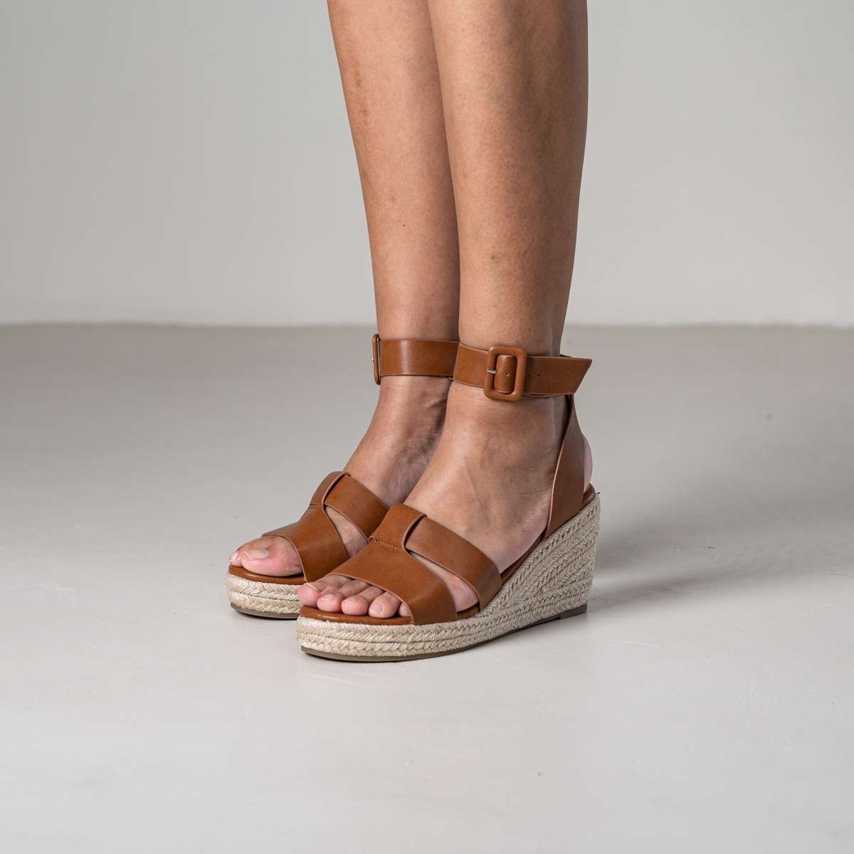 Tohima wedge sandals with crisscross straps and ankle strap