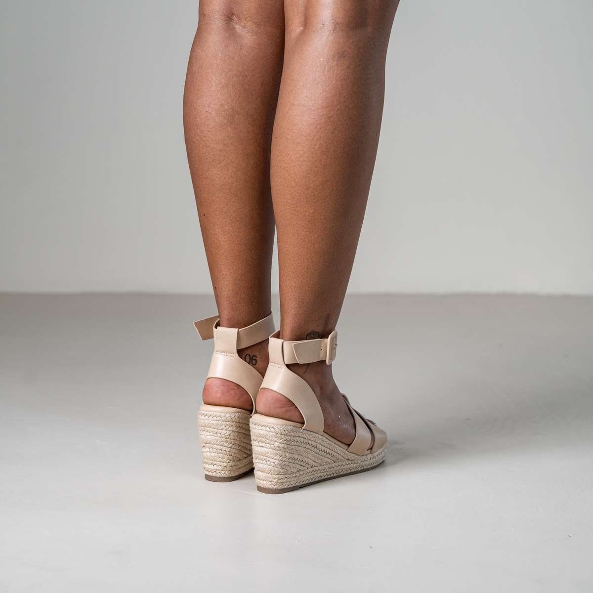 Tohima wedge sandals with crisscross straps and ankle strap