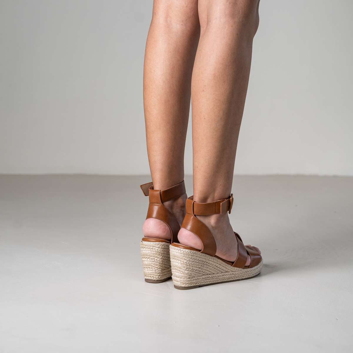 Tohima wedge sandals with crisscross straps and ankle strap