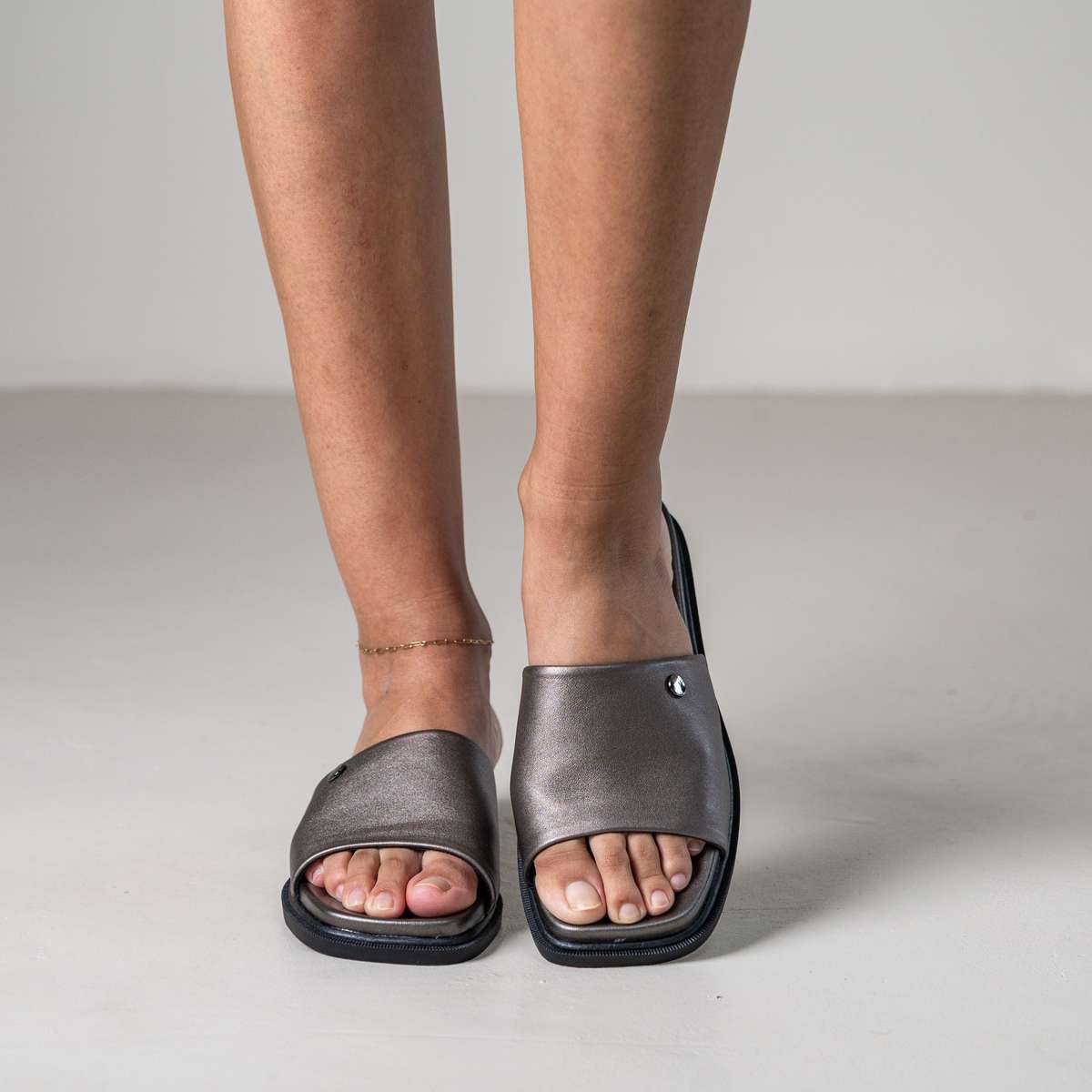 Marley slip-on sandal with front metal stud