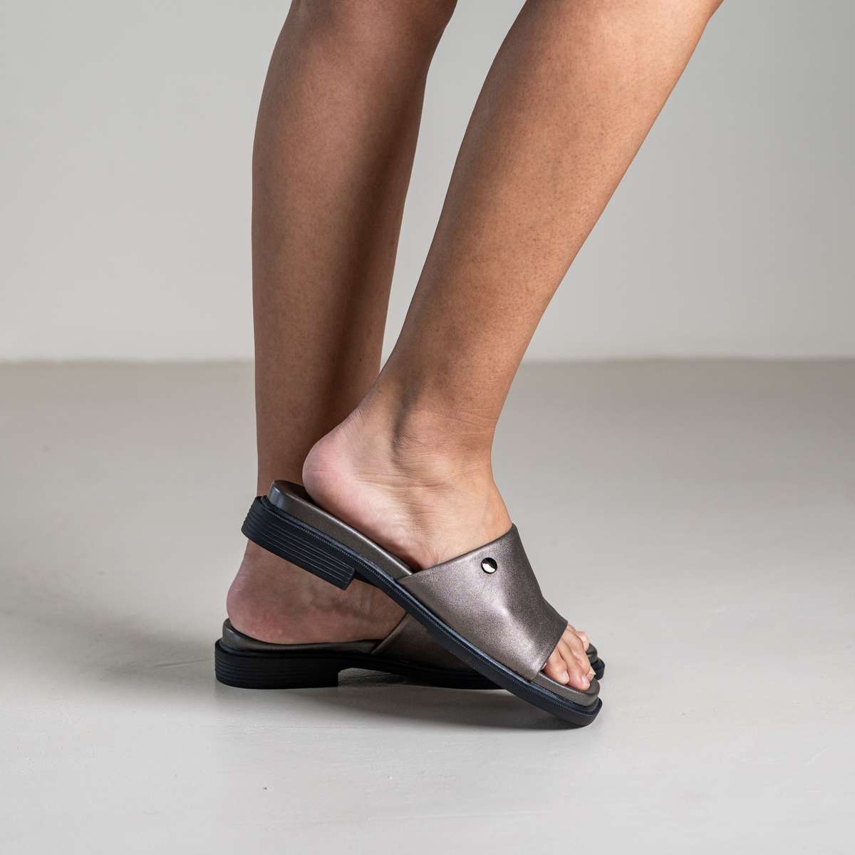 Marley slip-on sandal with front metal stud