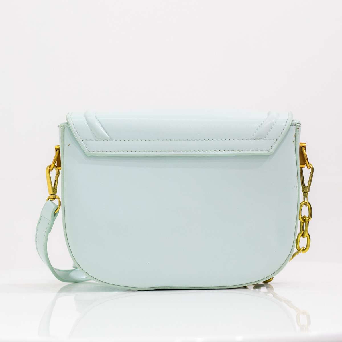 Quentin faux leather saddle bag light blue
