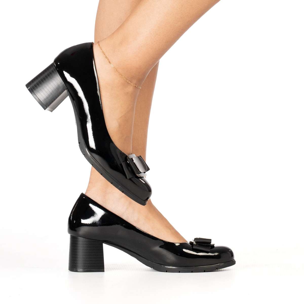 Ronit women's sleek patent heel with bold buckle accent