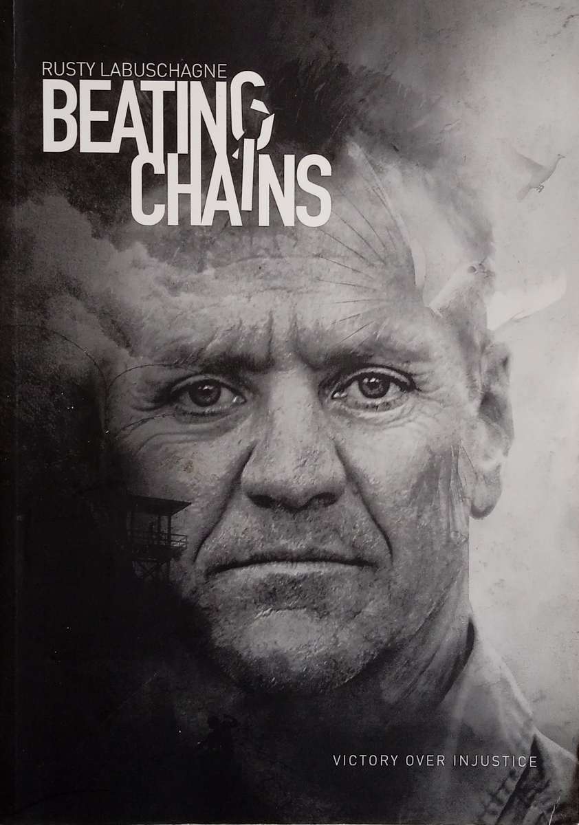 Beating Chains: Victory Over Injustice [Inscribed] | Rusty Labuschagne