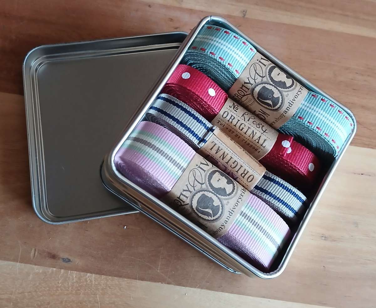 Silver Ribbon Gift Tin  4 x 5m Ribbon