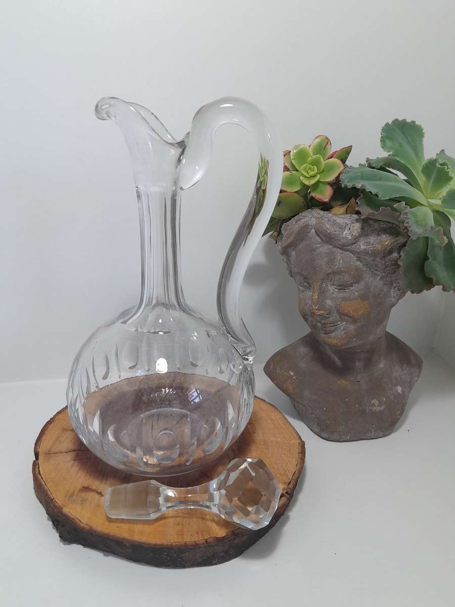 A Handled Crystal Decanter with Multifaceted Stopper