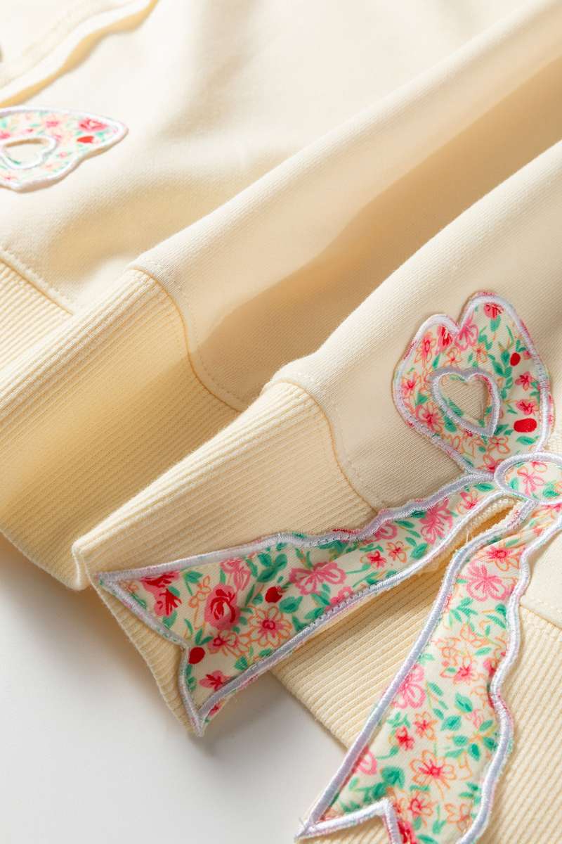 Beige Plus Size Raw Seam Detail Floral Bow Patched Baggy Pullover