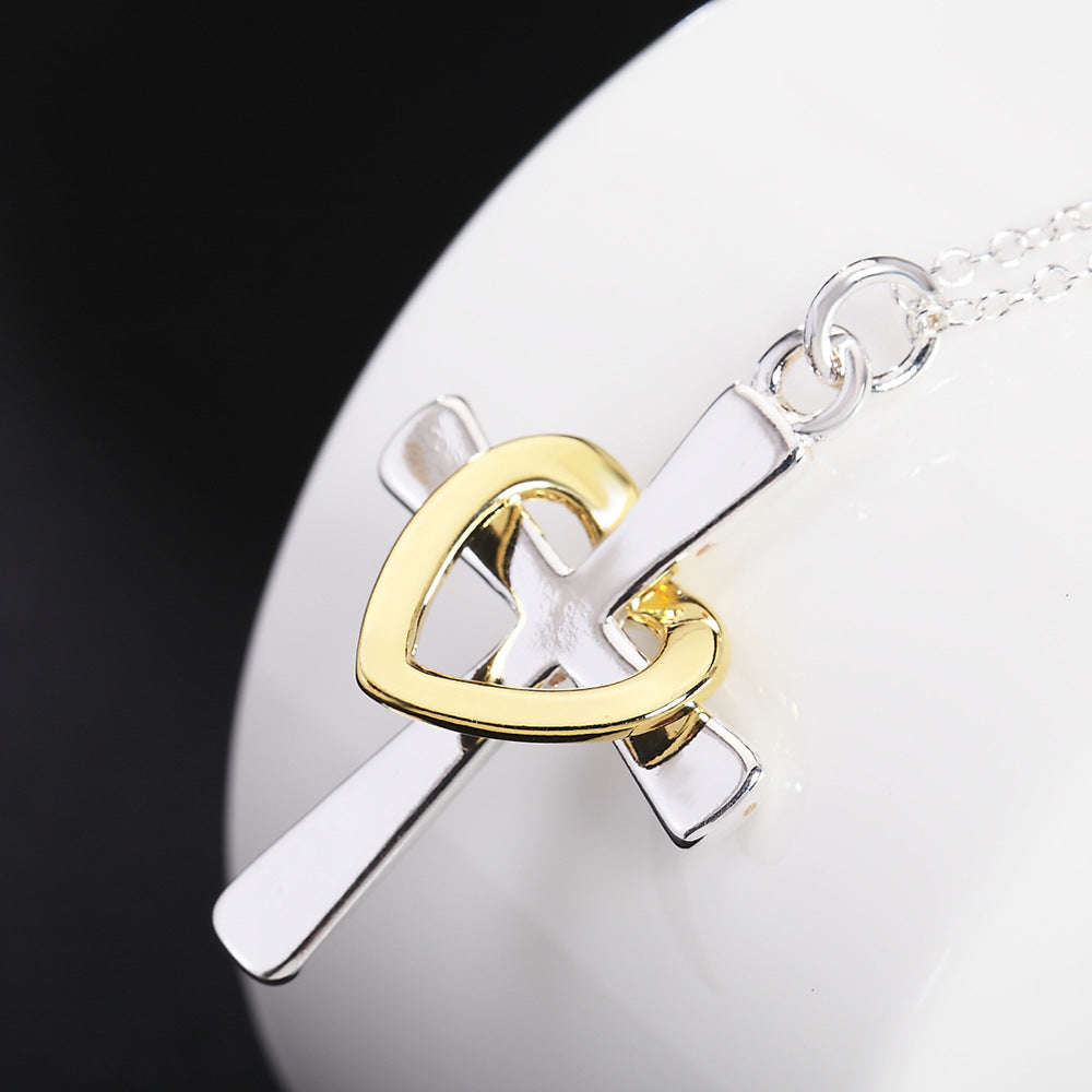 Stunning Sterling silver filled ladies Cross pendant with draped heart design + Chain