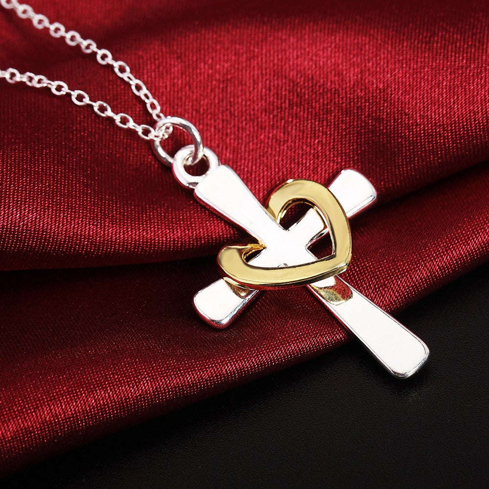 Stunning Sterling silver filled ladies Cross pendant with draped heart design + Chain