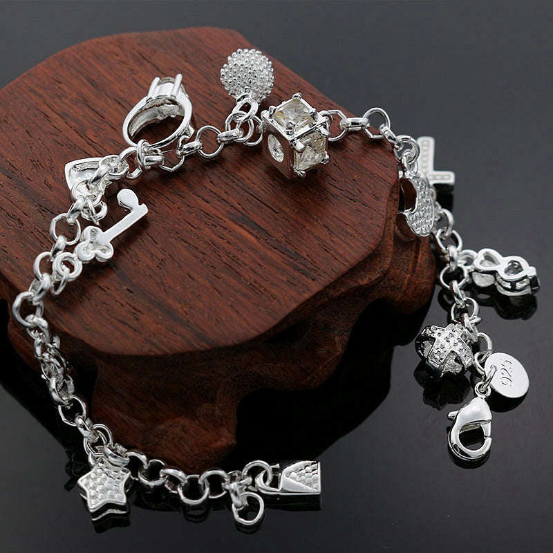 Designer 925 Sterling Silver filled Charm bracelet with 12 charms included