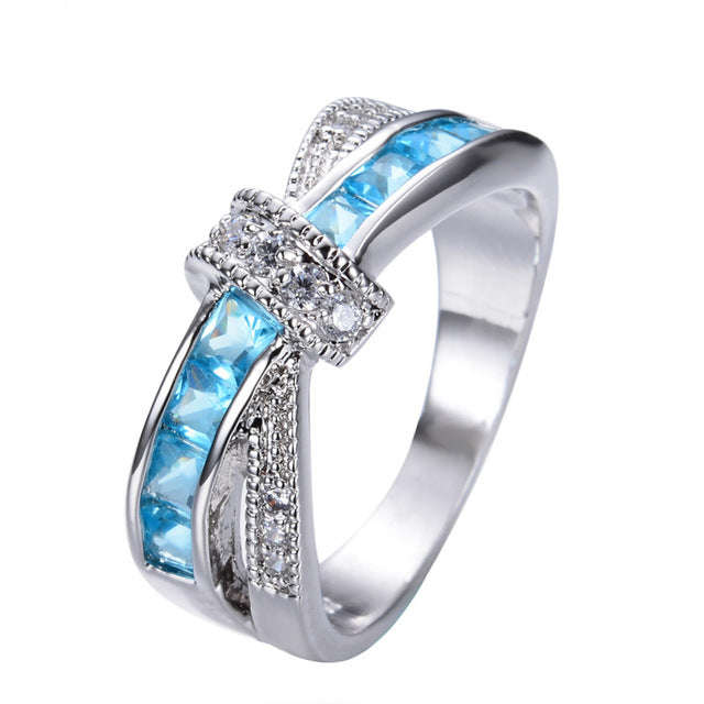 Designer cross over Blue AAA crystal ring, Sizes US 6 - 10