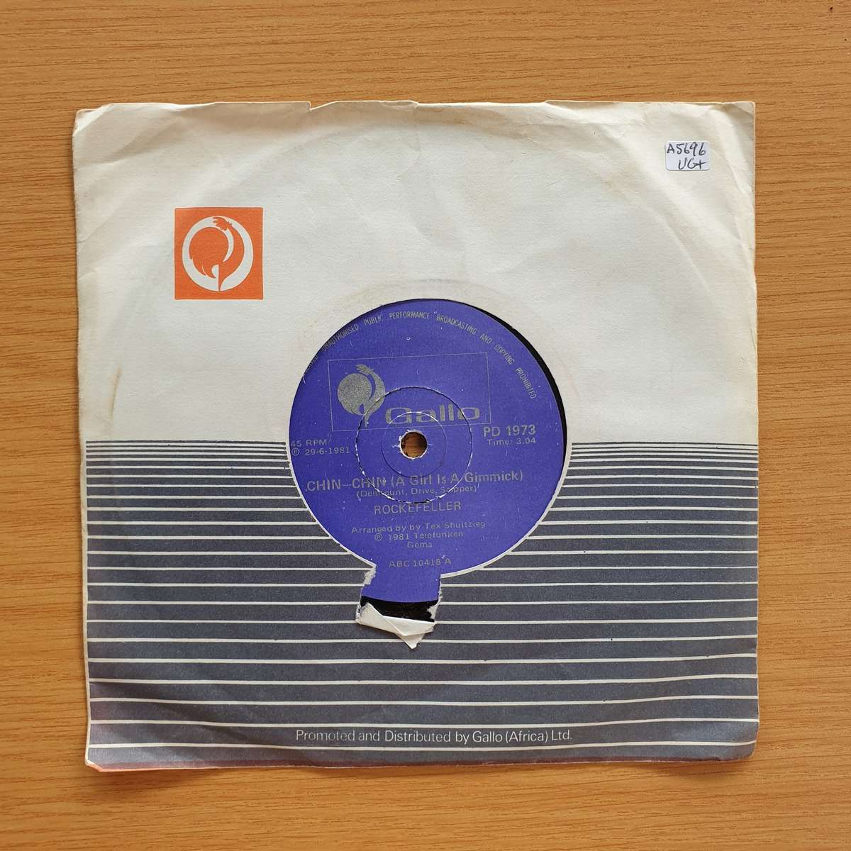 Rockefeller  - Chin-Chin A Girl Is A Gimmick   | Vinyl 7" Single | (VG+)