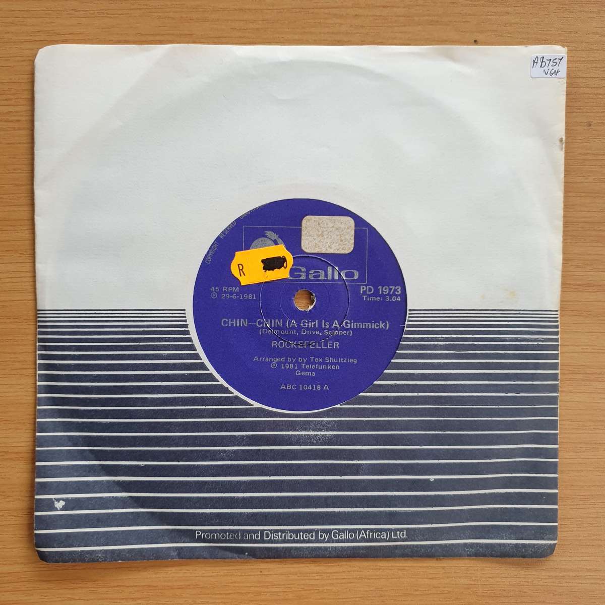 Rockefeller   Chin-Chin (A Girl Is A Gimmick) | Vinyl 7" Single | (VG+)