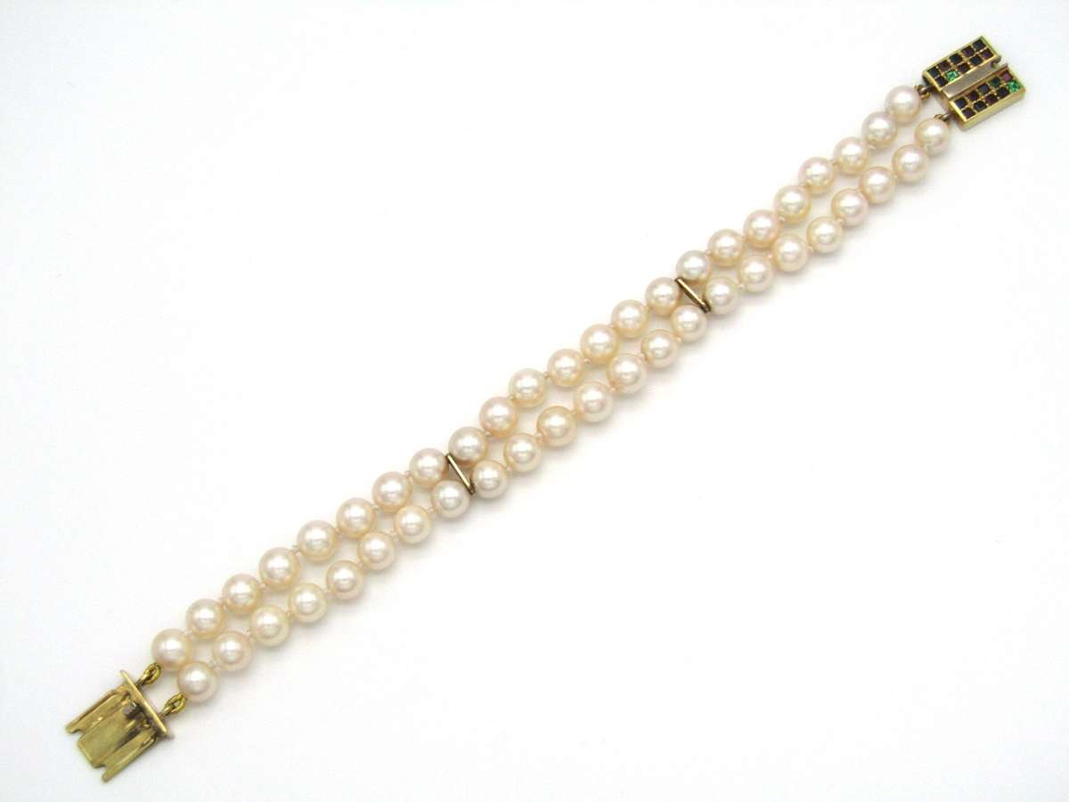 Mid-century, 18K gold double-strand cultured pearl, ruby, sapphire and emerald bracelet