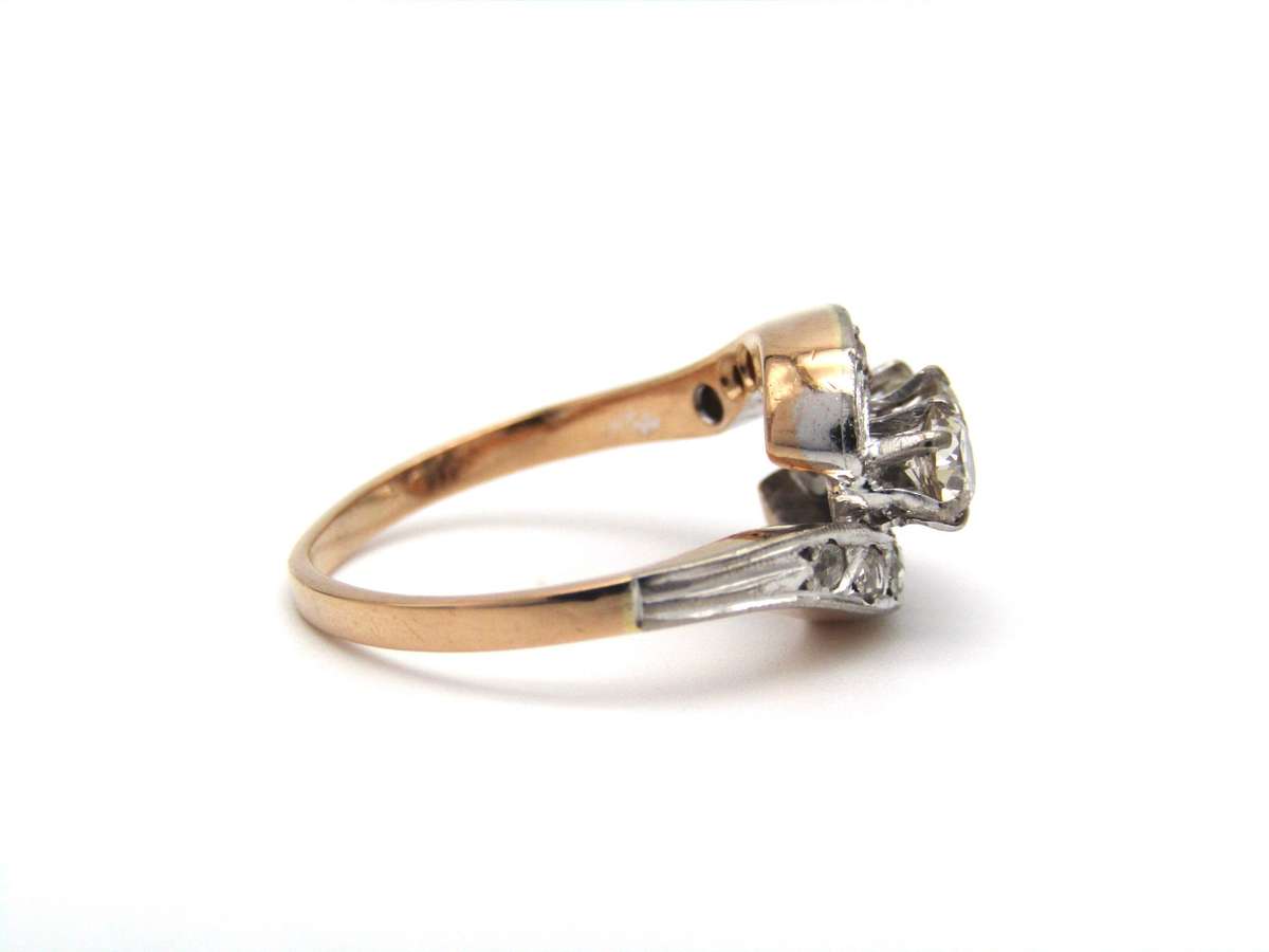 Mid-century, 18K gold trilogy diamond bypass ring