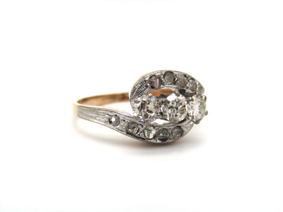 Mid-century, 18K gold trilogy diamond bypass ring