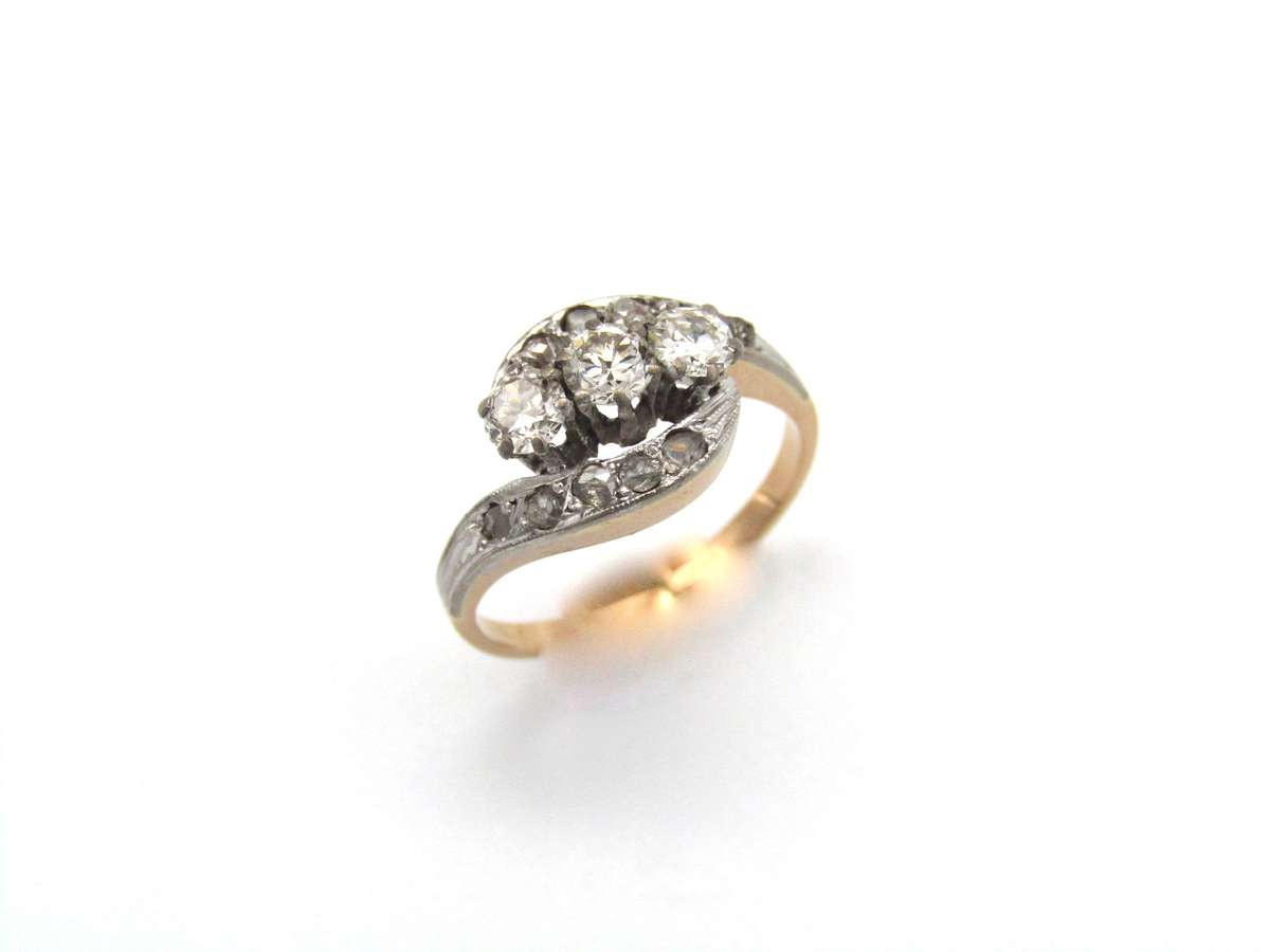 Mid-century, 18K gold trilogy diamond bypass ring