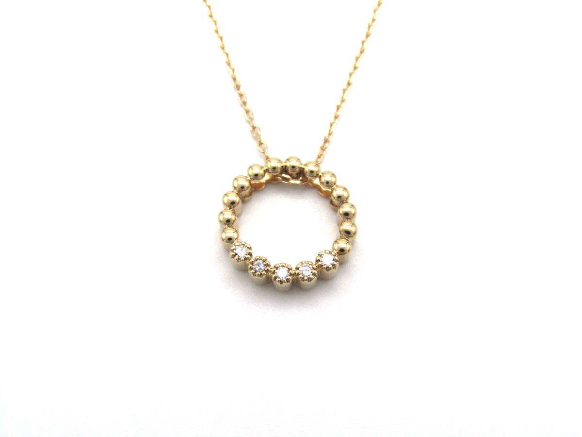 Estate, 9K gold diamond 'circle' pendant