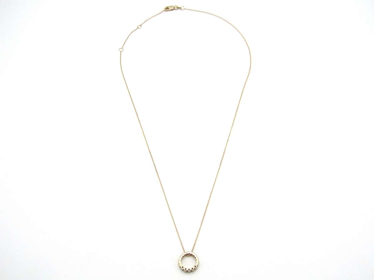 Estate, 9K gold diamond 'circle' pendant