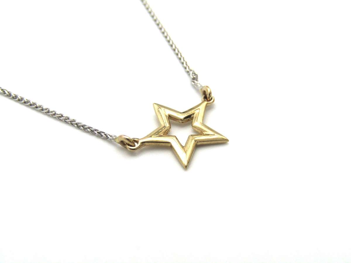 Estate, 9K gold 'star' necklace
