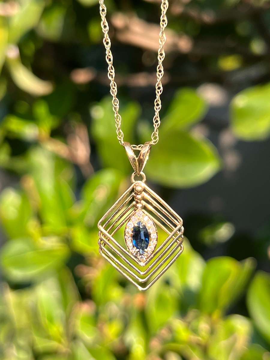 Estate, 18K gold sapphire and diamond pendant