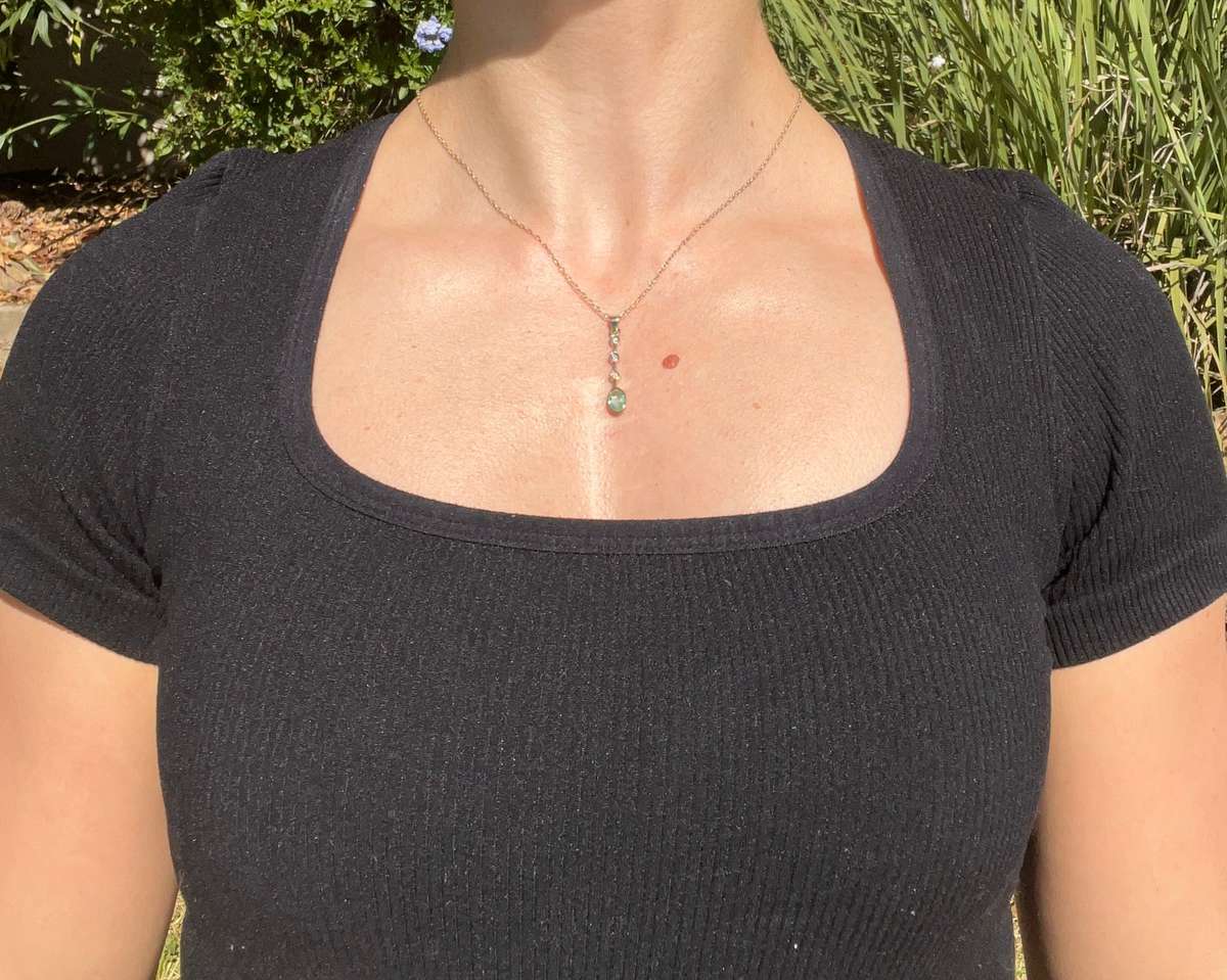 Estate, 18K gold green beryl and diamond pendant