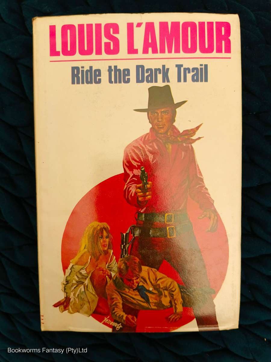 Ride the Dark Trail by Louis L'Amour
