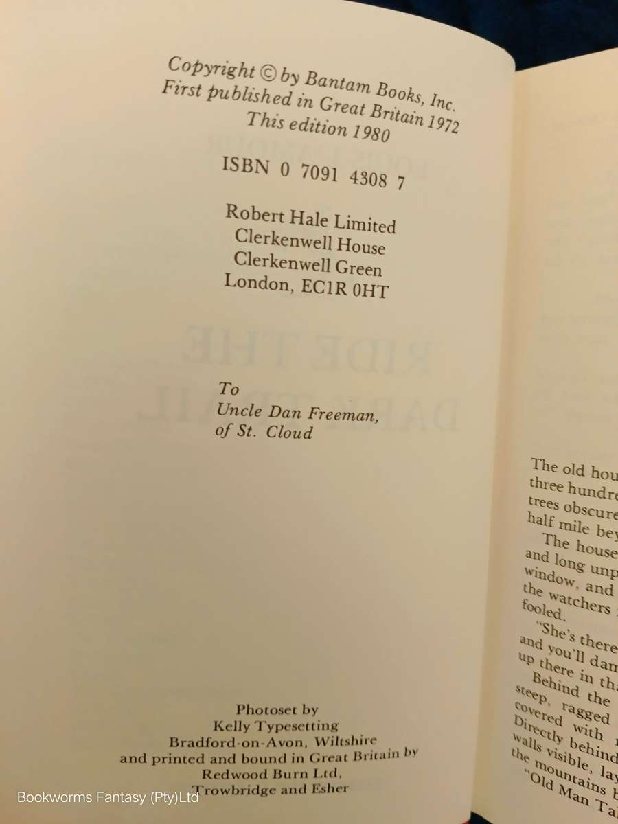 Ride the Dark Trail by Louis L'Amour