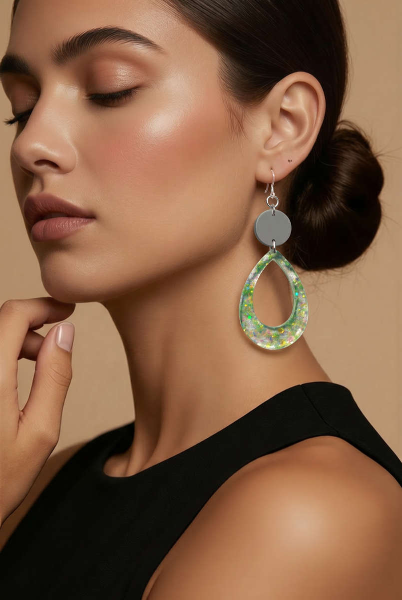 A cool funky party earring that glows in the dark has uv glow and comfy hooks. Beautiful lightwei...