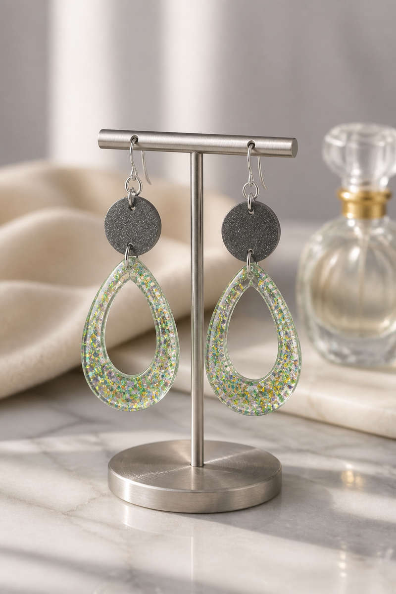A cool funky party earring that glows in the dark has uv glow and comfy hooks. Beautiful lightwei...