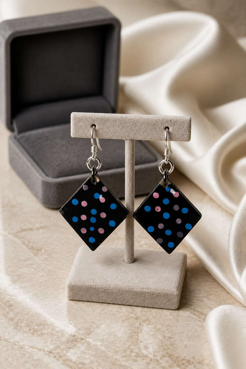 Cool funky elegance . Handmade hypo-allergenic earrings. Lightweight and comfy for all day wear ....
