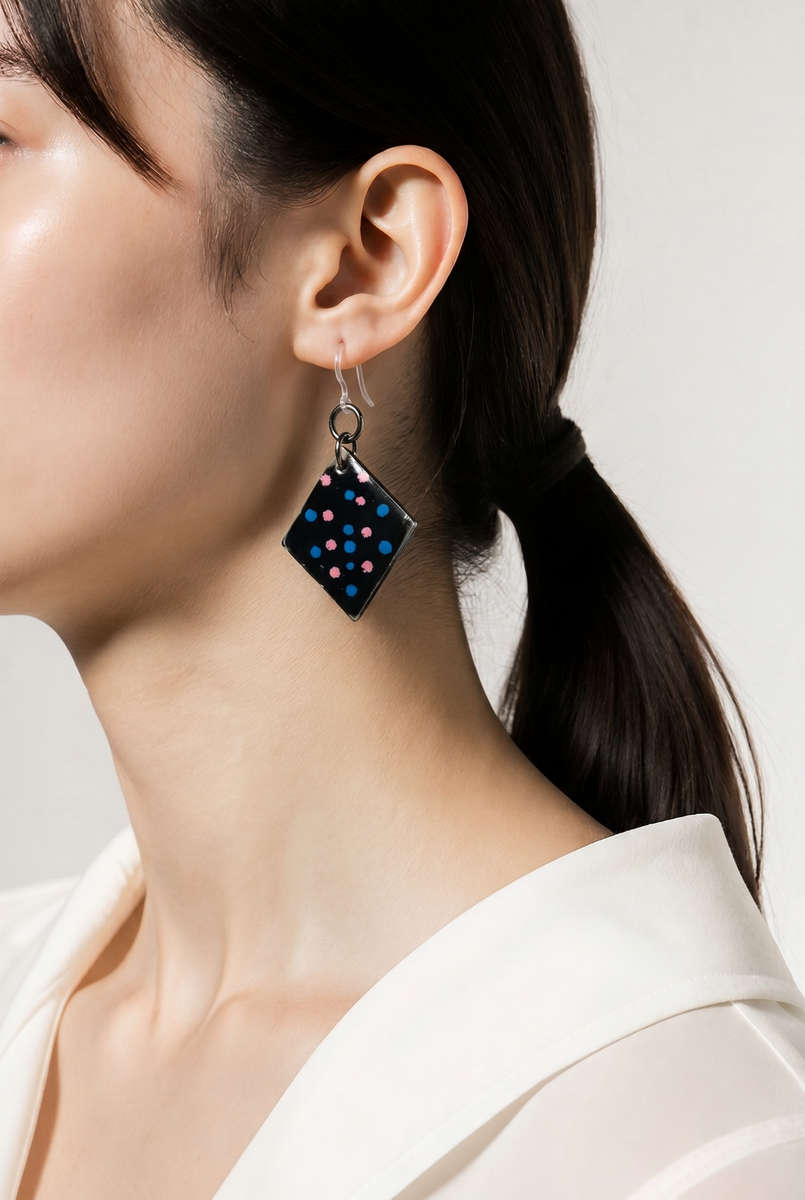 Cool funky elegance . Handmade hypo-allergenic earrings. Lightweight and comfy for all day wear ....