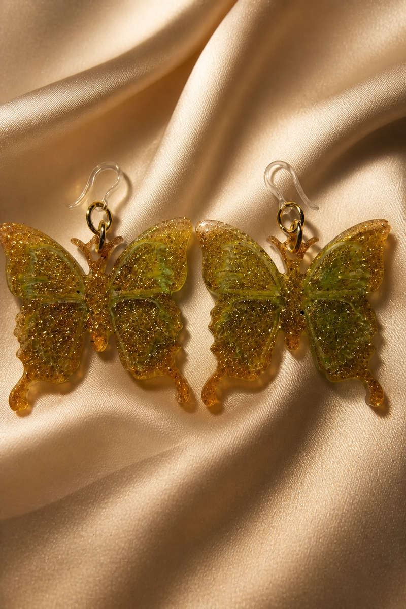 Beautiful stylish elegance . Handmade hypo-allergenic earring. Flutter your style before it flies...