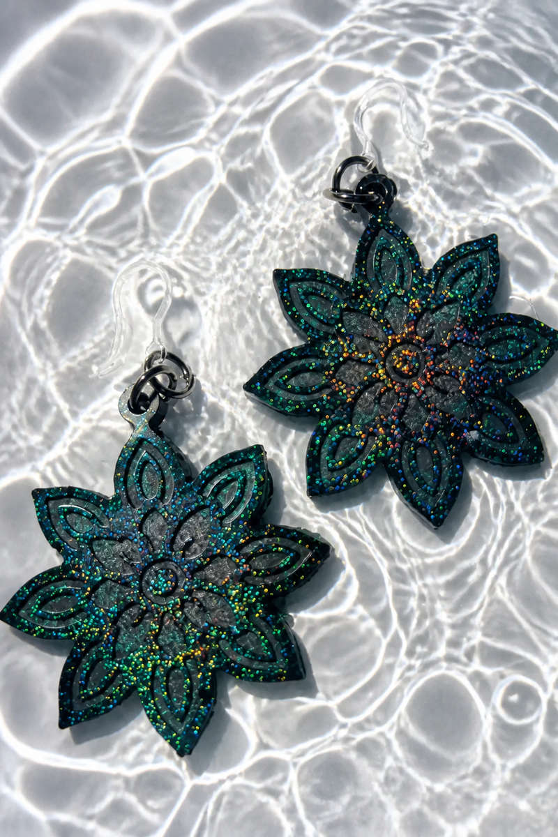 Elevate your evening look with these shimmering floral handcrafted earrings. Design X03 www.chako...