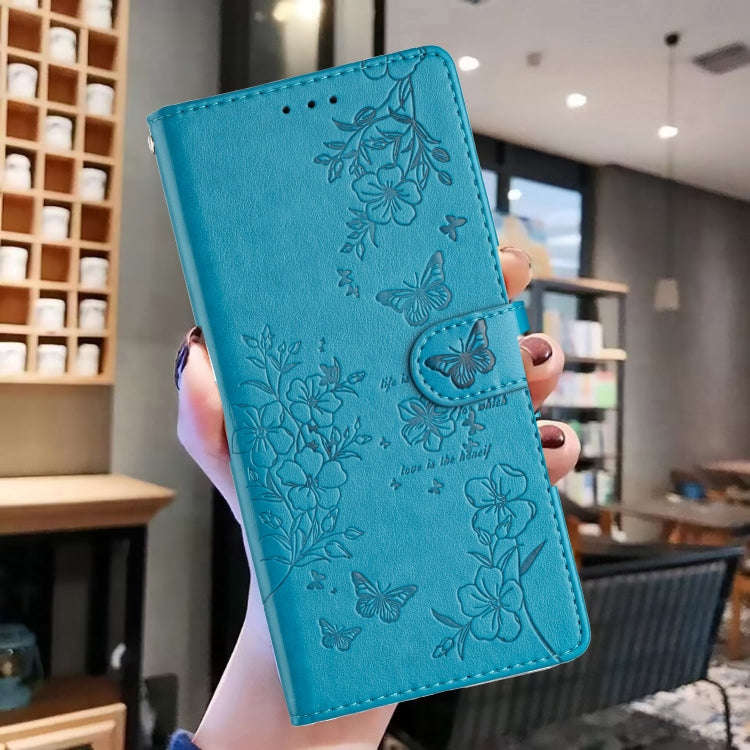 For Motorola Moto E13 Butterflies and Flowers Leather Phone Case(Blue)