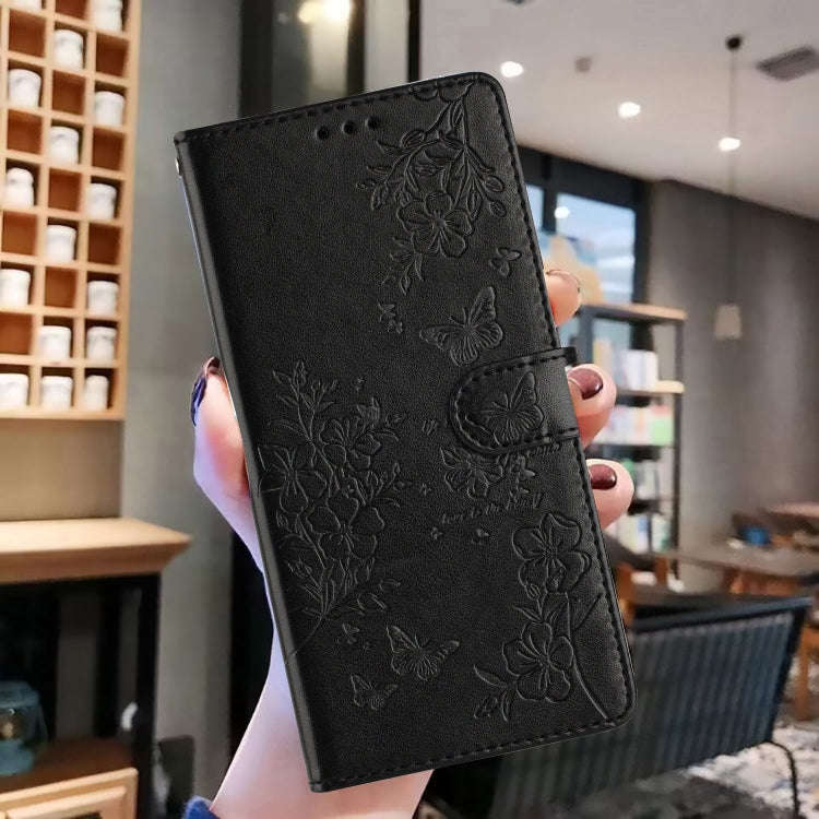 For Motorola Moto E32 Butterflies and Flowers Leather Phone Case(Black)