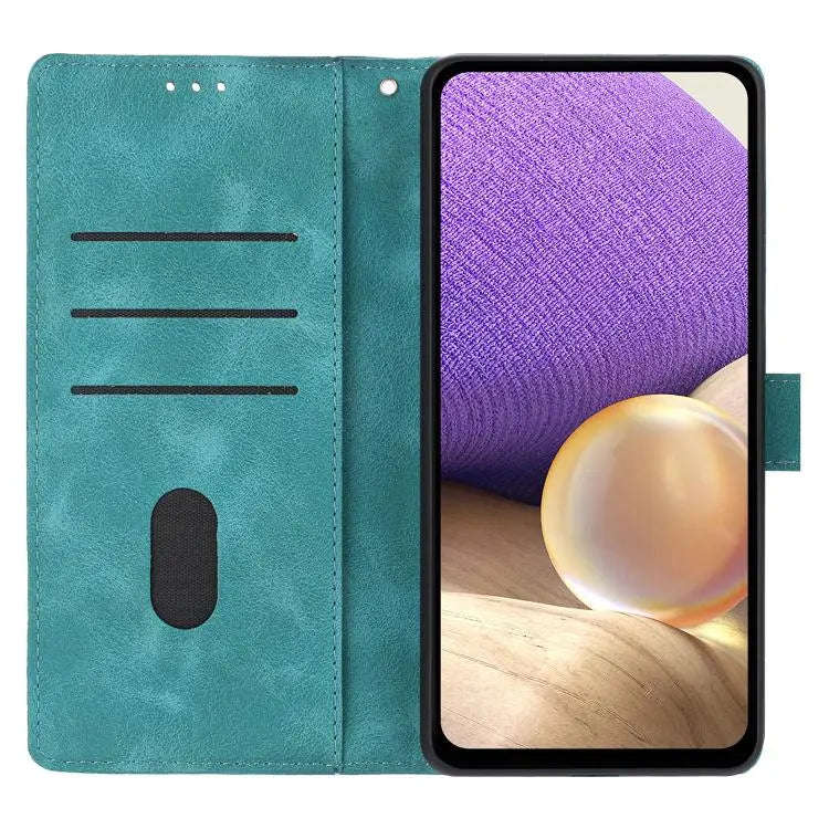 For Motorola Moto E32 Triangles Embossed Leather Phone Case(Green)
