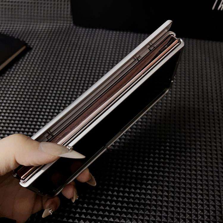 For Huawei Mate X6 Kevlar Carbon Fiber Spring Axis Nameplate Shockproof Phone Case(Black)