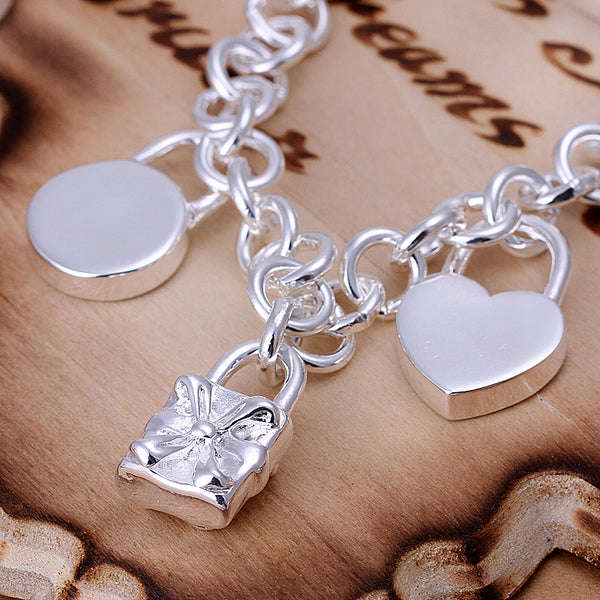 5 Silver Charms Bracelet