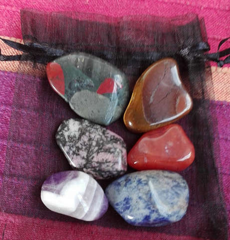 Selection of 6 Large to XL Crystals with pouch Properties Inside