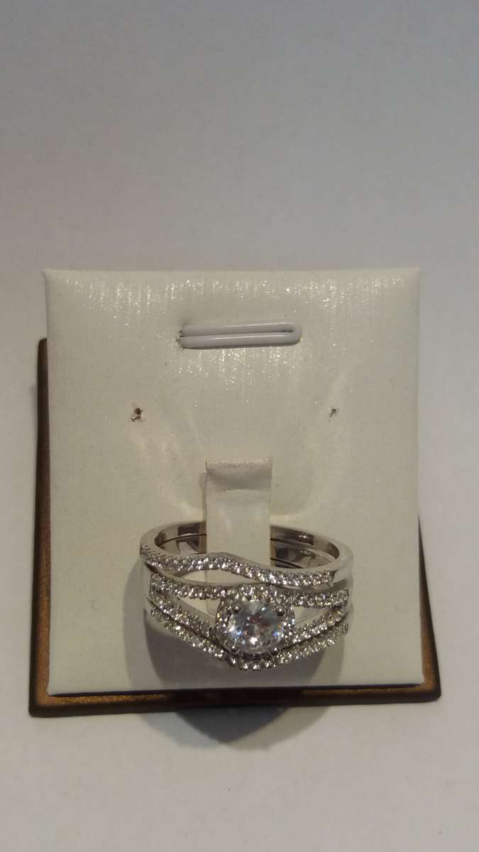 Sterling Silver Solitaire dress ring with channel set cubic zirconias and matching bands - N - N