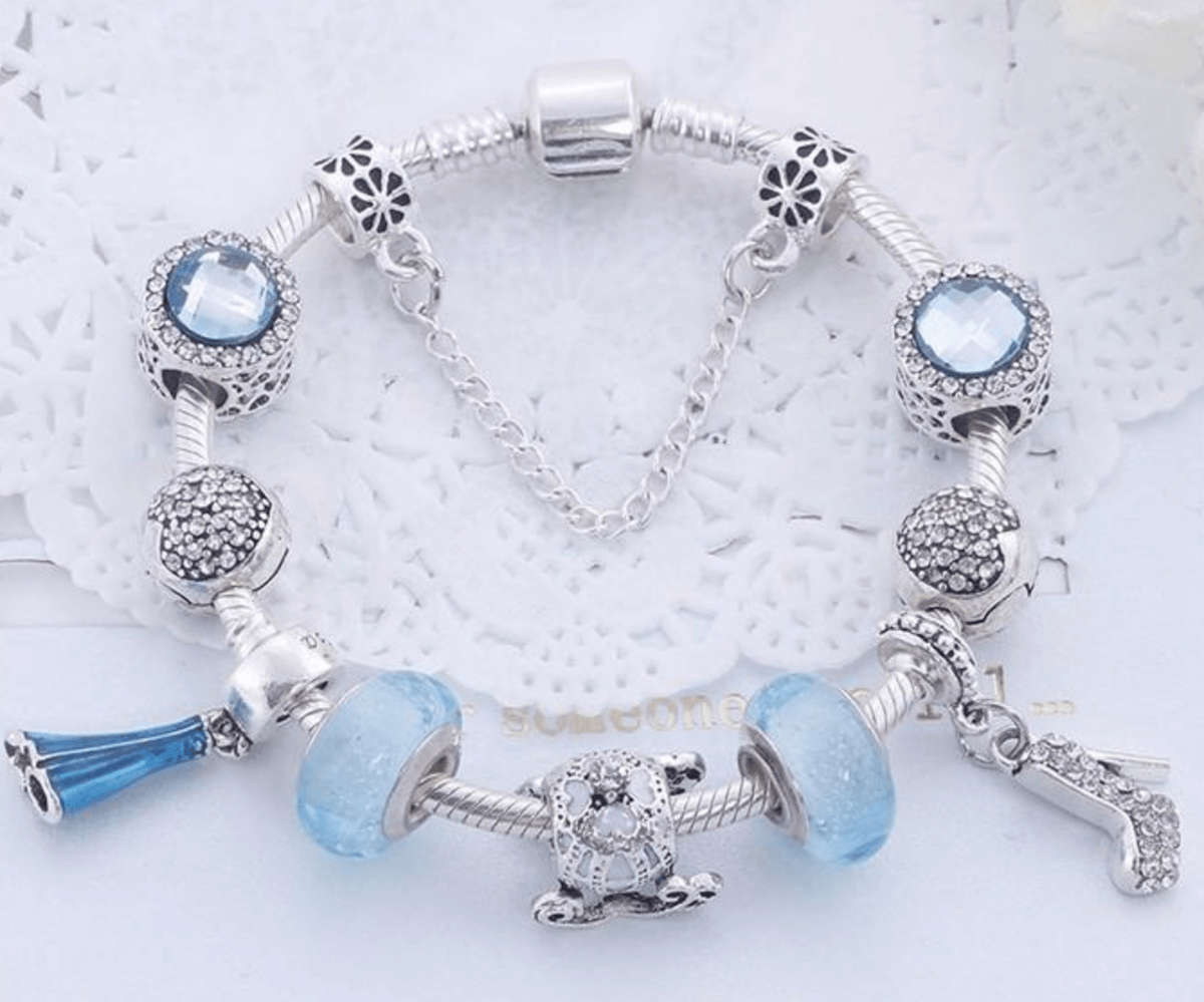 Charming Light Blue and Silver colour bracelet with Fashion themed charms - 21cm
