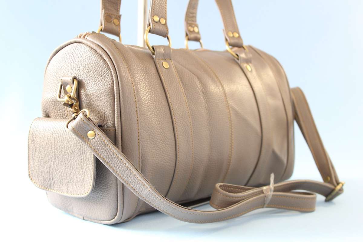 100% Genuine Cow Hide Handbag/Travel bag in Taupe