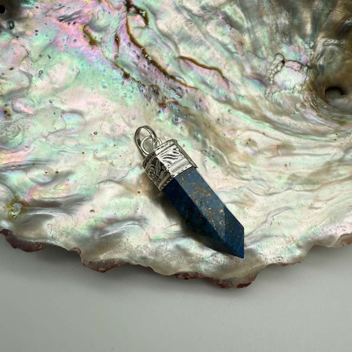 Lapis Lazuli Petite Crystal Pencil Point White Metal Pendant from India
