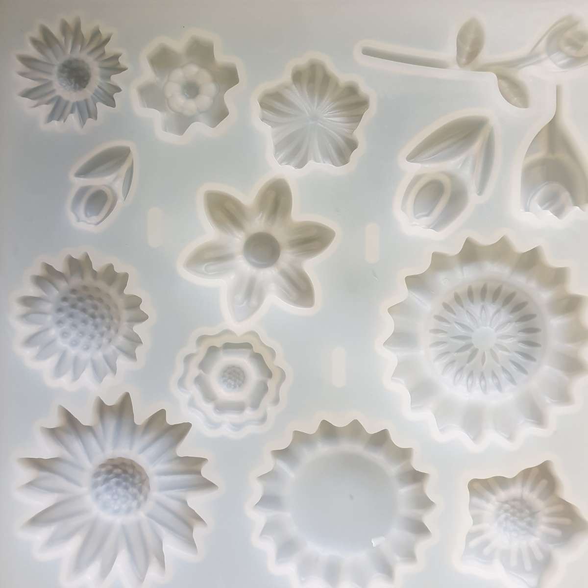 Flower soft silicone mould, top right daisy 4.5cm