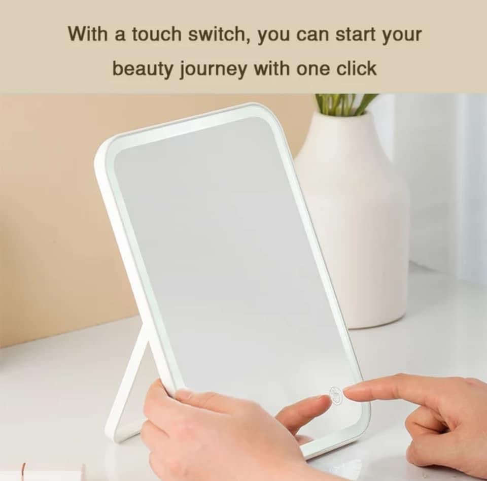 Folding mirror with light