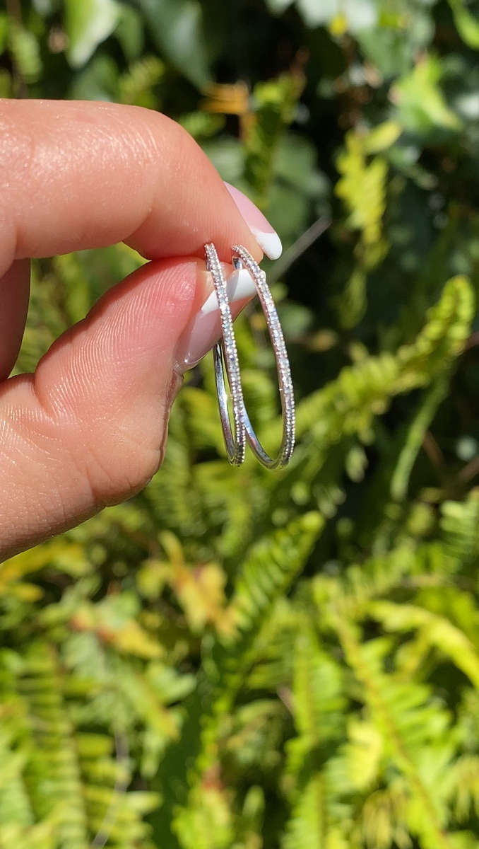 9K gold diamond hoop earrings.